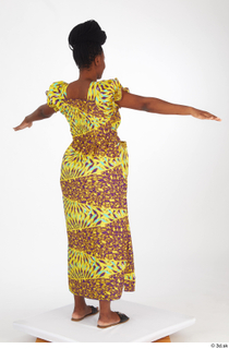 Dina Moses dressed standing t poses whole body yellow long…